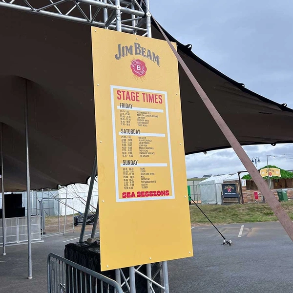 A full colour printed Foamex board mounted to a truss structure for outdoor event use. Rigid, weather resistant and ideal for festival signage, schedules and temporary outdoor displays.